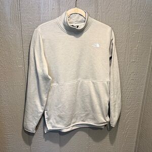 The North Face women’s light green mock neck Sweater